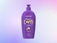 Aussie Miracle Curls Leave-In Detangling Milk (Image via Amazon)